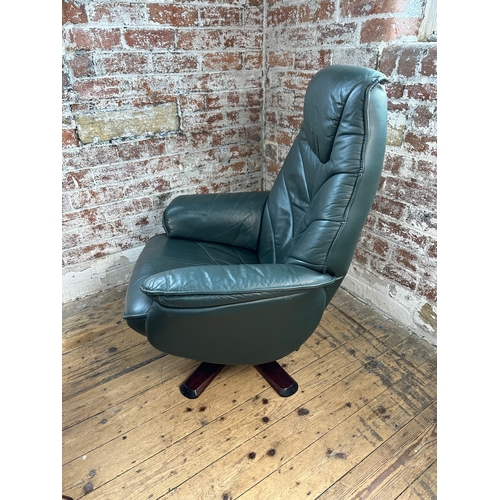 487 - Green Leather Reclining Armchair & Footstool