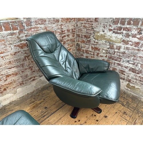 487 - Green Leather Reclining Armchair & Footstool