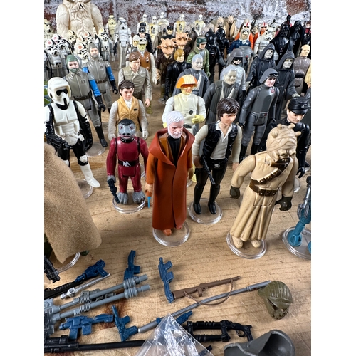 116 - Star Wars - 240 Loose Kenner Action Figures with guns & accessories