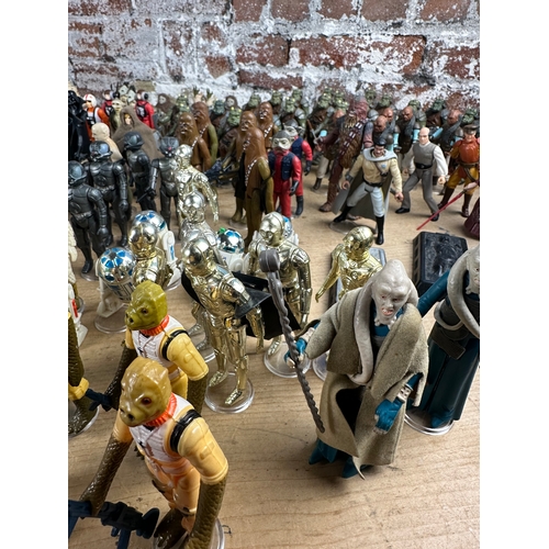 116 - Star Wars - 240 Loose Kenner Action Figures with guns & accessories