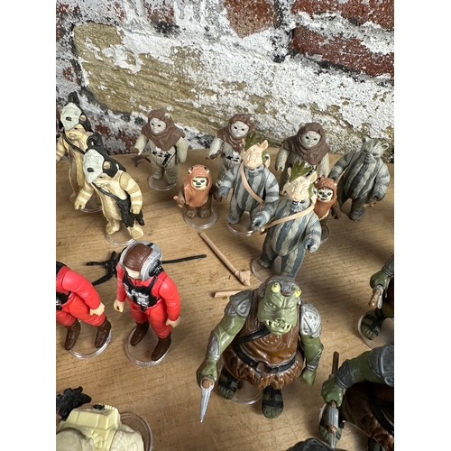 116 - Star Wars - 240 Loose Kenner Action Figures with guns & accessories