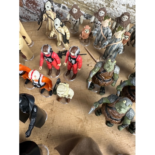 116 - Star Wars - 240 Loose Kenner Action Figures with guns & accessories