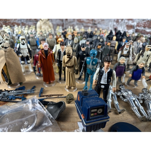 116 - Star Wars - 240 Loose Kenner Action Figures with guns & accessories