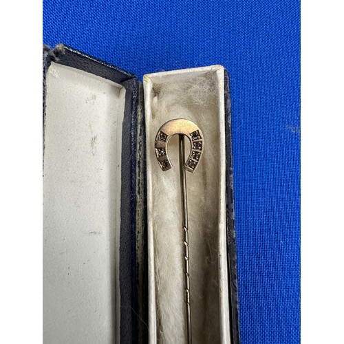 43 - 9ct Gold Horse Shoe Stick Pin