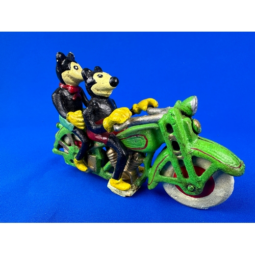 296 - Cast Iron Mickey and Minnie Mouse on Motorbike