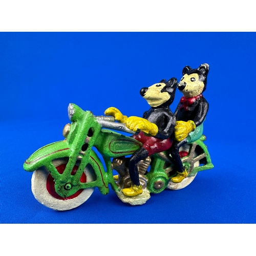 296 - Cast Iron Mickey and Minnie Mouse on Motorbike