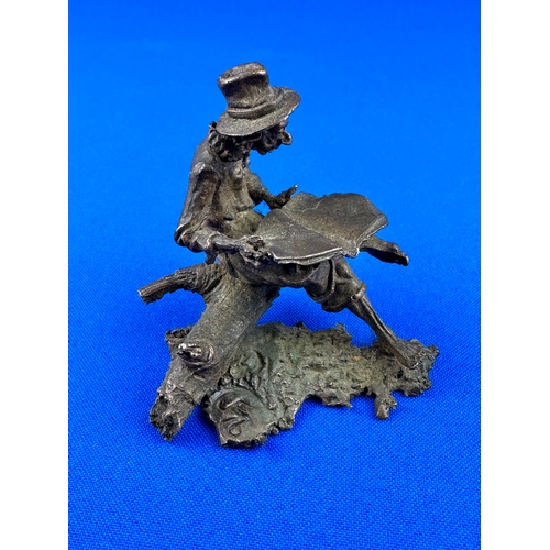 291 - Vintage Spelter Figure of a Cowboy with a Newspaper, Initial & Number to base