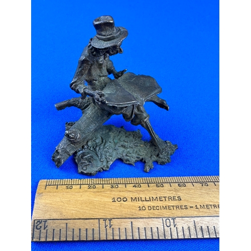 291 - Vintage Spelter Figure of a Cowboy with a Newspaper, Initial & Number to base