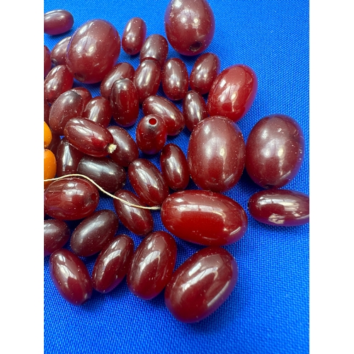 10 - Quantity of Cherry Amber Bakelite Type Early Plastic Beads. Weight 41-9g....