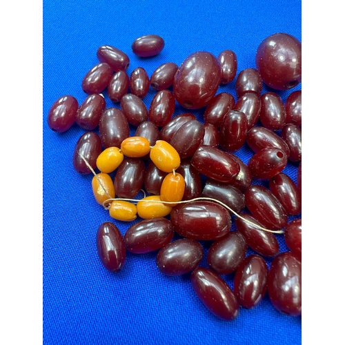 10 - Quantity of Cherry Amber Bakelite Type Early Plastic Beads. Weight 41-9g....