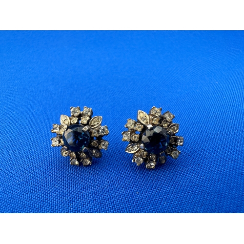 44 - Paste Flowerhead Earrings. Blue and Clear Paste Set in Unmarked White Metal...