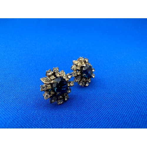 44 - Paste Flowerhead Earrings. Blue and Clear Paste Set in Unmarked White Metal...