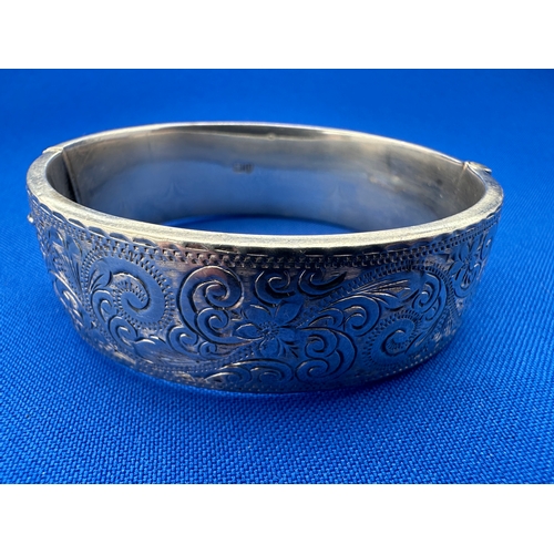 48 - Engraved Silver Bangle by Smith and Pepper, Chester 1959. Weight 26.5g...