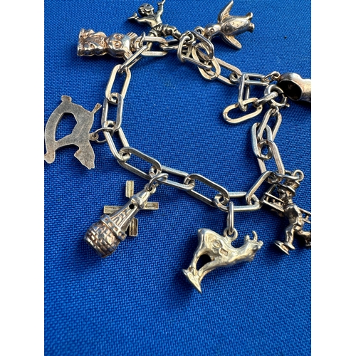 34 - Silver Charm Bracelet with 8 Charms