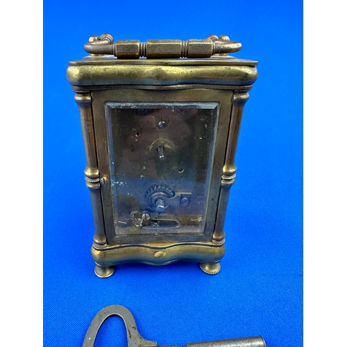 38 - Brass Four Wall Small Carriage Clock with Fancy Face - Ticks for a while then sticks, with key.