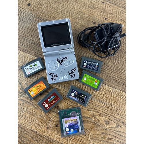 379 - Nintendo Gameboy Advance with Charger and Seven Games