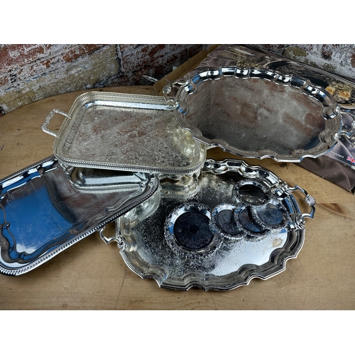 171 - Group of Silver Plated Trays with wine Coasters