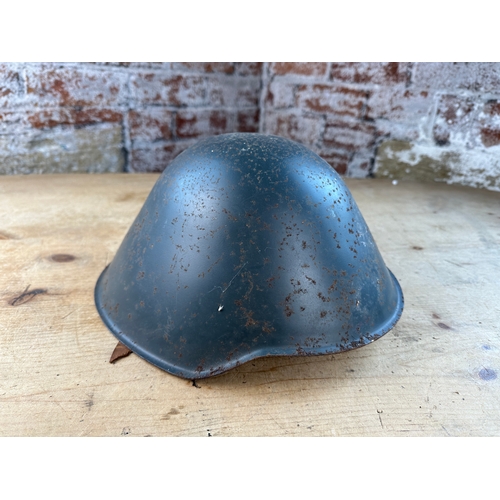 111 - Vintage East German Military Helmet