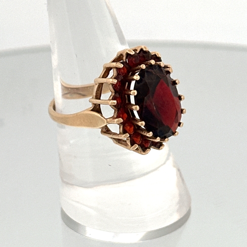 54 - 9ct Gold Ring Set with Garnets size Q 5.82g