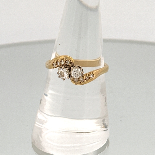 95 - 18ct Gold Ring set with Two Diamonds & 8 Smaller Diamonds size Q/P 2.63g