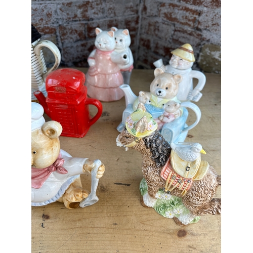 520 - Collection of novelty Tea Pots