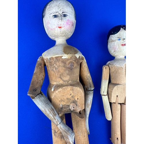 106 - Antique Carved Wooden Pegged Dolls