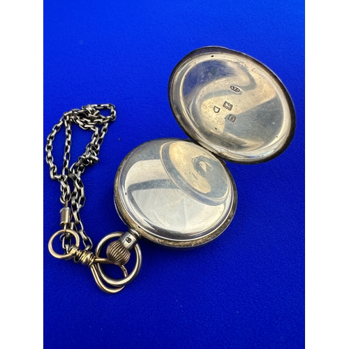 31 - Hallmarked Silver Pocket Watch and Chain - Working. London 1909