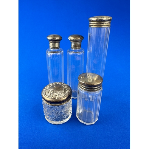 5 - Five Hallmarked Silver Topped Vanity Bottles