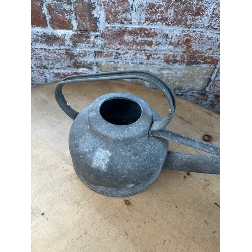 254 - Two Galvanised Vintage Watering Cans