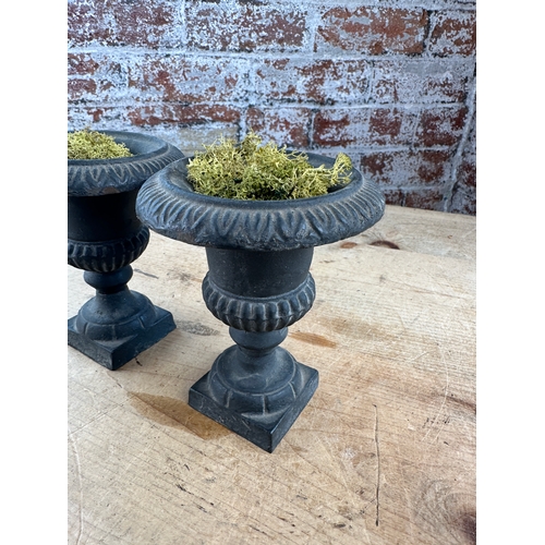 271 - Two Miniature Cast Iron Urns