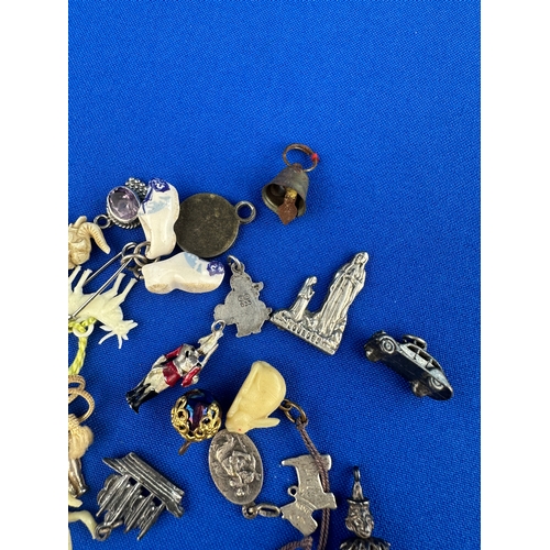 33 - Assorted Old Charms including some Silver