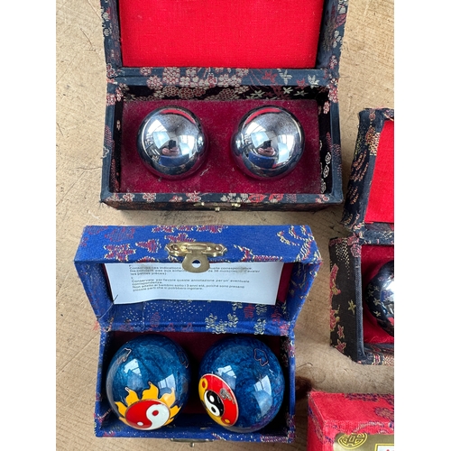 218 - Four Boxed Chinese Baoding Balls