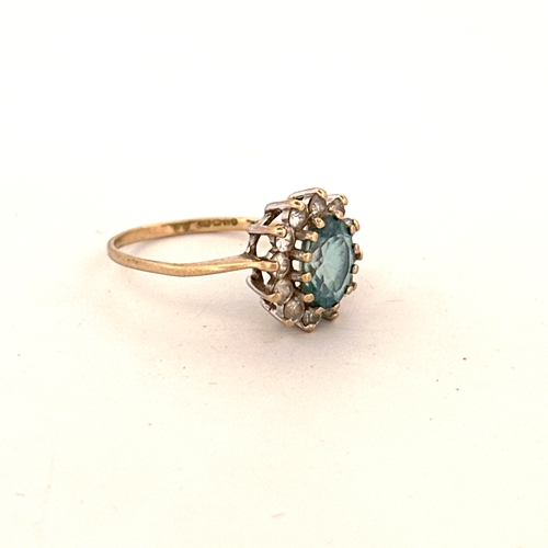 17 - 9ct Gold Ring Set with Large Blue Stone & Small White Stones 2.06g size P