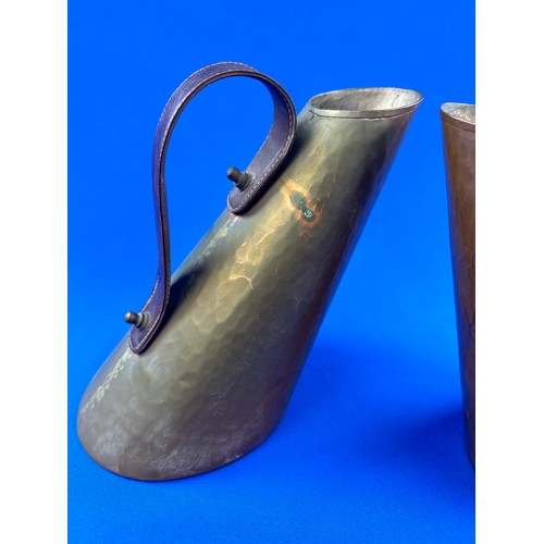 265 - Two Arts & Craft Copper Jugs with Leather Handles