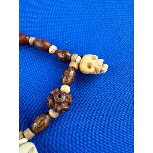 16 - Carved Wooden Bead & Vegetable Ivory Skull Bracelet
