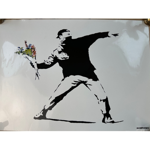 637 - Two Laminated Banksy Posters - See both pictures