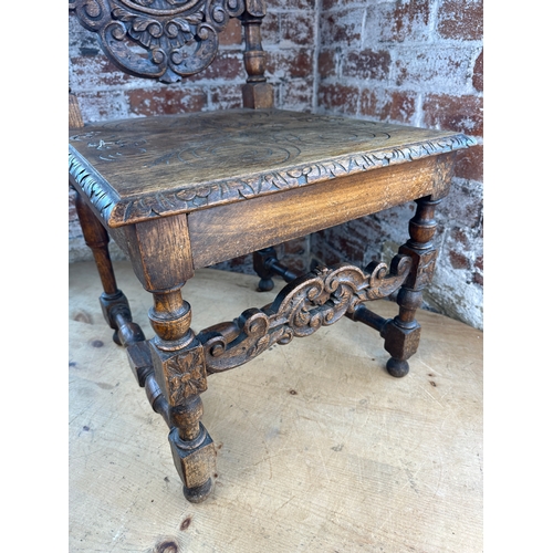 853 - Heavily Carved Oak High Back Chair