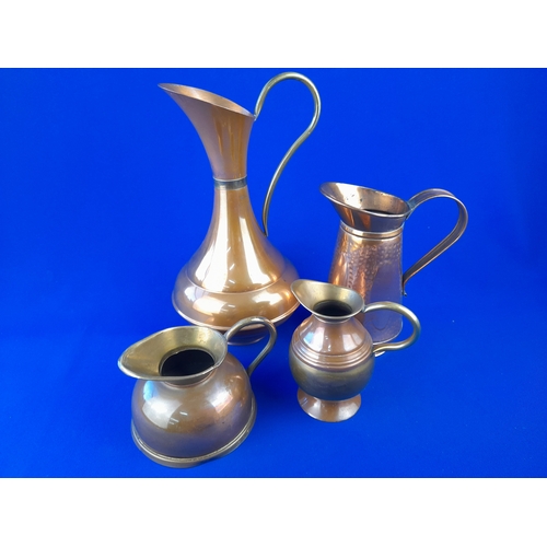 355 - Group of 4 Copper Jugs with Brass Detail