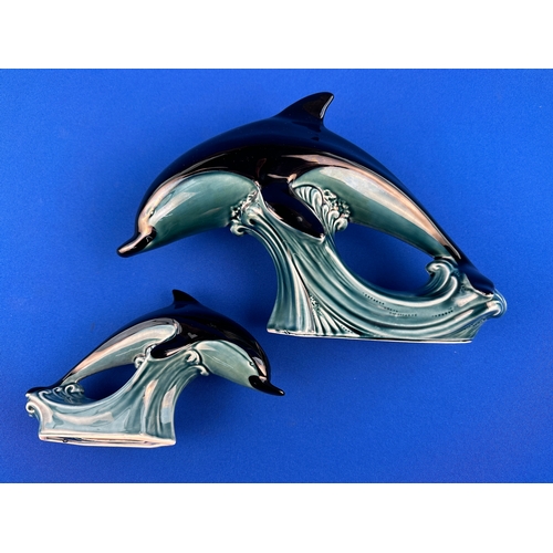 551 - Two Poole Pottery Dolphin Figures