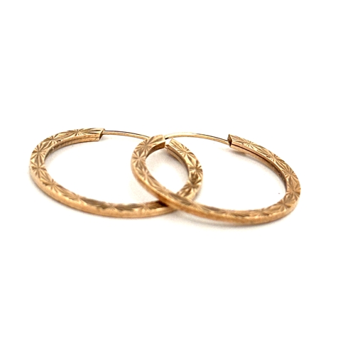 79 - Nine Carat Gold Engraved Hoop Earrings. 0.8g