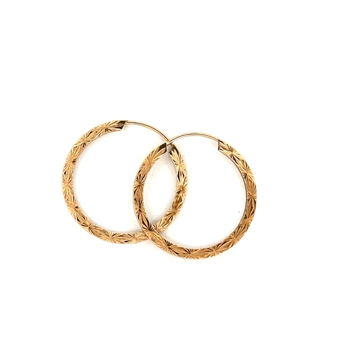 79 - Nine Carat Gold Engraved Hoop Earrings. 0.8g