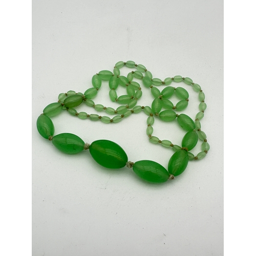 29 - Long Art Deco Graduated Uranium Glass Bead Necklace