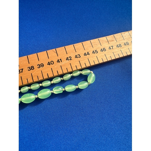 29 - Long Art Deco Graduated Uranium Glass Bead Necklace