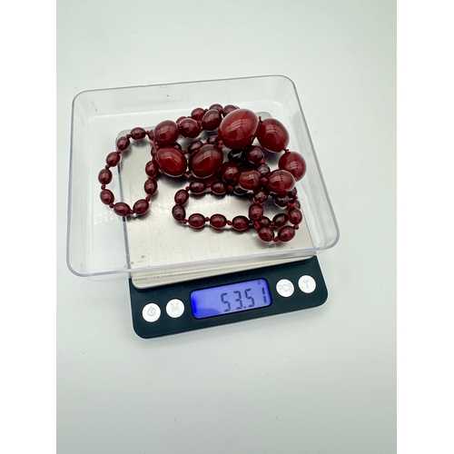 33 - Cherry Amber Bakelite Graduated Bead Necklace - 53.5g - approximately 85cm Long