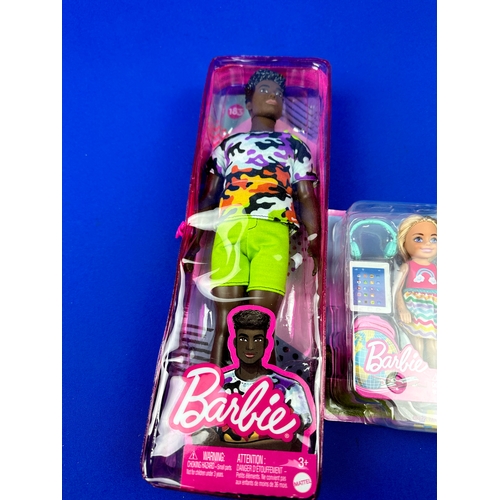 896 - Three as New Barbie Figures