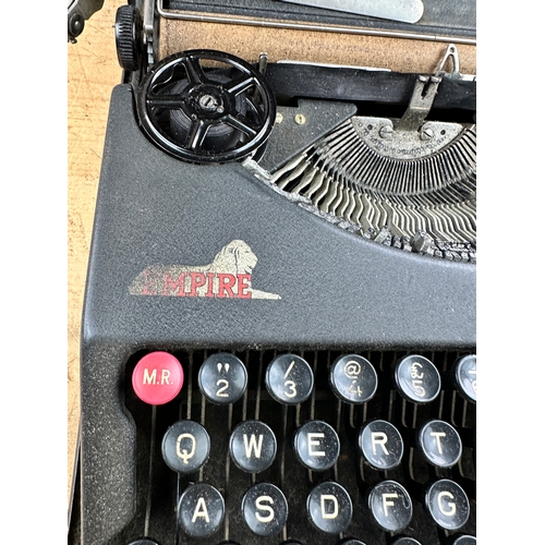 491 - Old Baby Empire Portable Typewriter