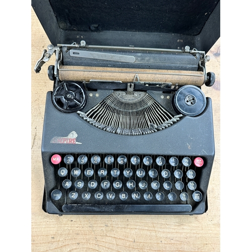 491 - Old Baby Empire Portable Typewriter