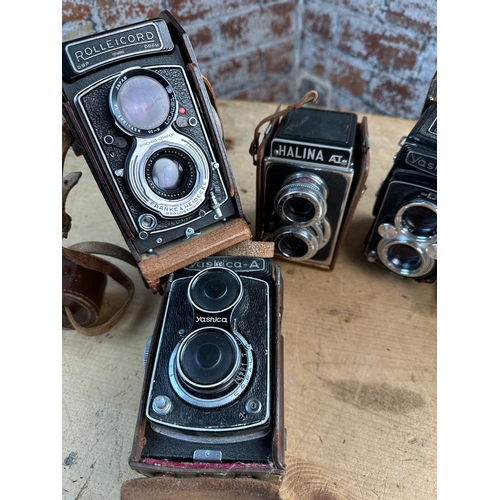 747 - A Rolleicord VA model 2 6x6 120 medium format TLR camera w/ Xenar 75mm f3.5 lens, Halina , Yashica a... 