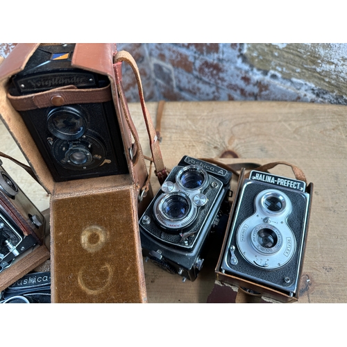 747 - A Rolleicord VA model 2 6x6 120 medium format TLR camera w/ Xenar 75mm f3.5 lens, Halina , Yashica a... 