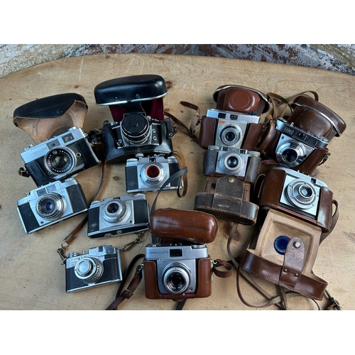 750 - Collection of 11 Vintage Cameras inc. Konica, Exakta, Zeiss Ikon Continette etc.